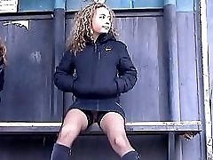 Upskirt gallery with curly haired schoolgirl in fishnets hunted down and filmed