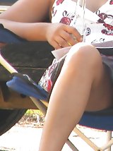 23 pictures - This chocolate babe is very hot. Up the skirt