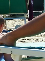 12 pictures - Tiny micro bikini girls on beach