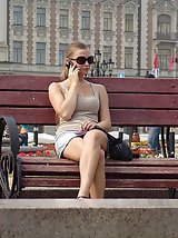 12 pictures - Babe is sitting getting sexy up skirt shot