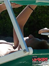 12 pictures - Pretty girls play with bikini titties