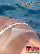 12 pictures - Bikini shots with hot nude elements