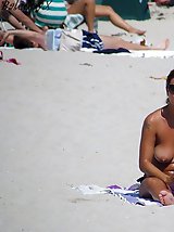 12 pictures - Cute babes fix their sexy bikinis