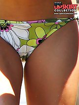 12 pictures - Colorful bikinis worn by sexy dolls