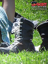 12 pictures - Curly brunette voyeured in a public place. Upskirt images