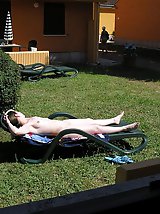 12 pictures - Teen nudist shows both hot holes